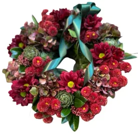 Bordó élő virágos görögkoszorú – 25 cm