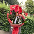 Piros flamingós ballagási csokor macis betűzővel